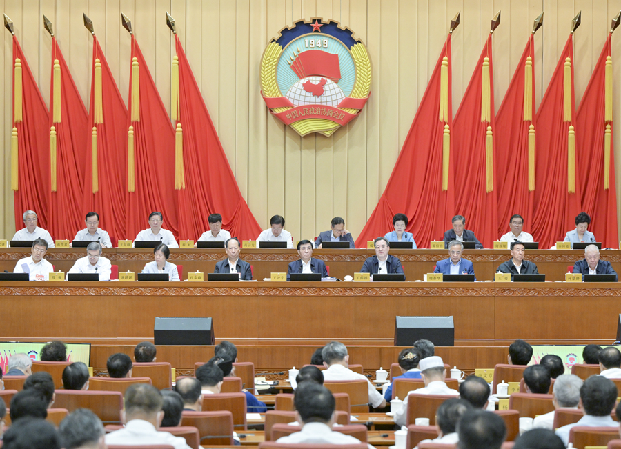 全国政协十四届常委会第三次会议开幕 王沪宁主持 丁薛祥作报告